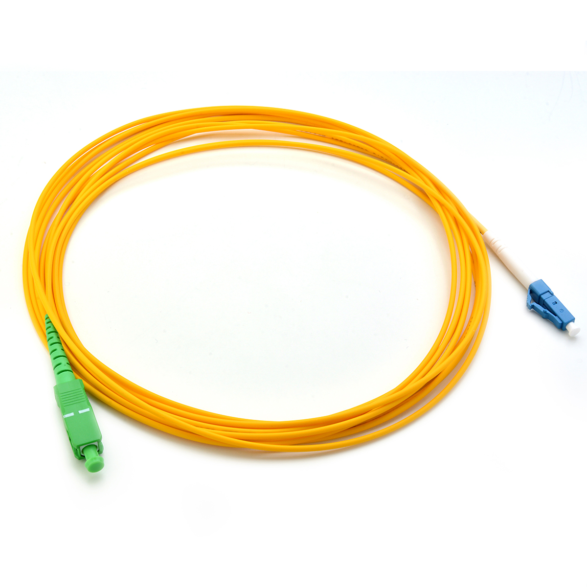 Yellow optical fiber patchcord with green LC/APC 8 ̊ connector > blue LC/UPC